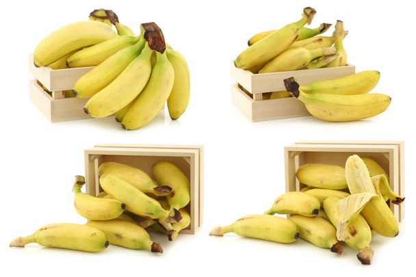 mini banane fresche in una scatola di legno su sfondo bianco - Foto, immagini