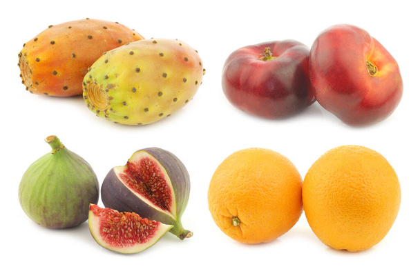 Assorted tropical fruit on a white background - Photo, Image