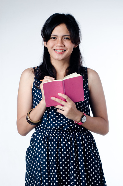 Young Beauty And Smart College Girl With Pink Notebook - Photo, Image
