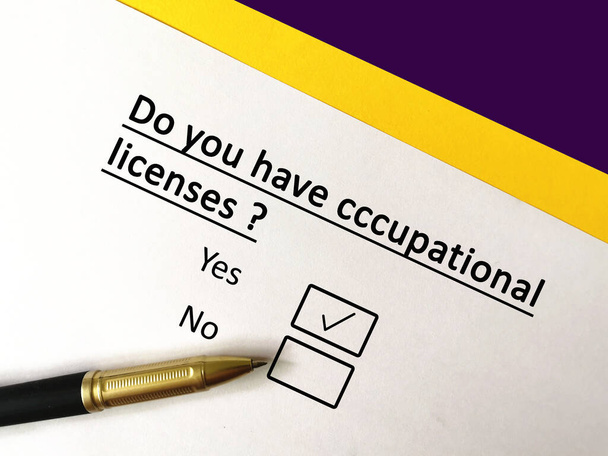 One person is answering question. He has occupational licenses. - Photo, Image
