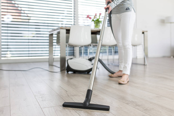 Attractive Female with Vacuum Cleaner - Fotoğraf, Görsel