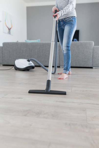 Attractive Female with Vacuum Cleaner - Foto, imagen