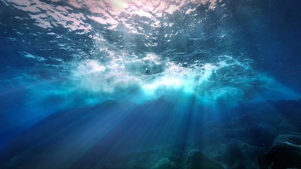 Gyönyörű és csodálatos víz alatti fotó hullámok fénysugarak. Egy búvárkodásból az Atlanti-óceán Kanári-szigetein. - Fotó, kép