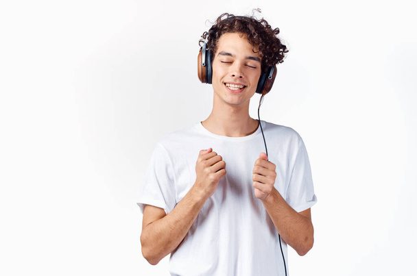 man in white t-shirt cropped view headphones music entertainment - Valokuva, kuva