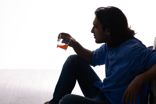 Young man suffering from alcoholism - Photo, Image