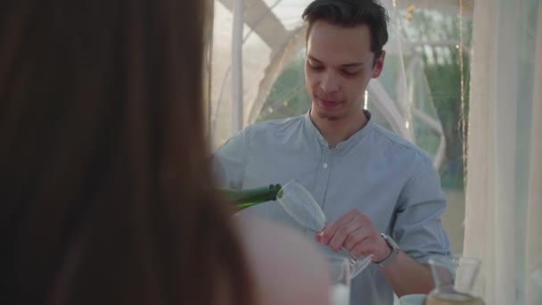 Young couple celebrates anniversary with champagne - Footage, Video