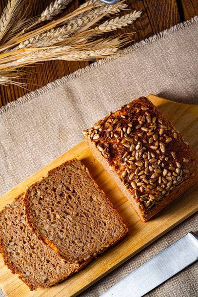 Moist wholemeal bread, crushed or ground whole grain - Photo, image