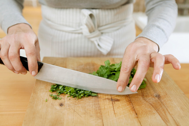 Chopping fresh green parsley - Photo, Image