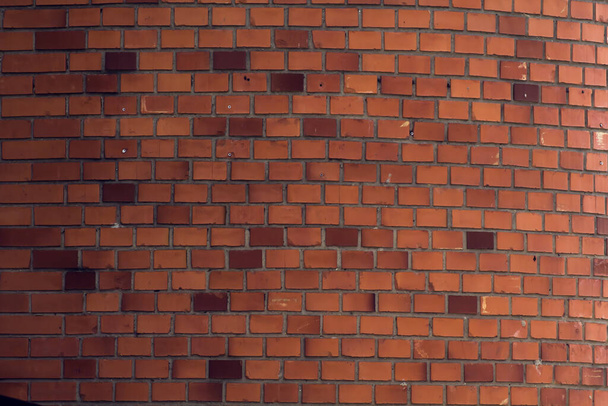 Horizontal red bricks background. A part of wall of the building - Photo, Image