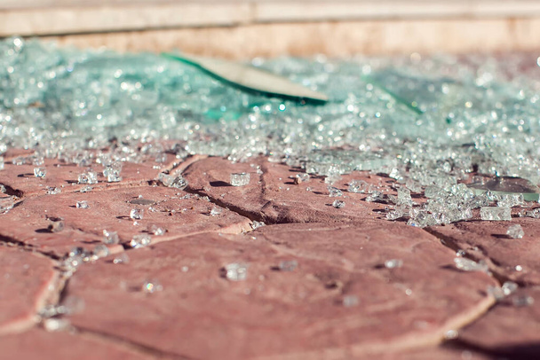 A lot of shards of glass on the ground outdoor - Photo, Image