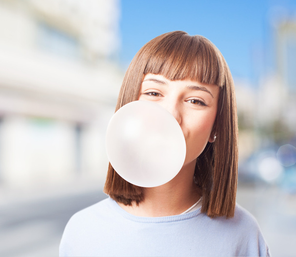 Girl doing with chewing gum - Photo, Image