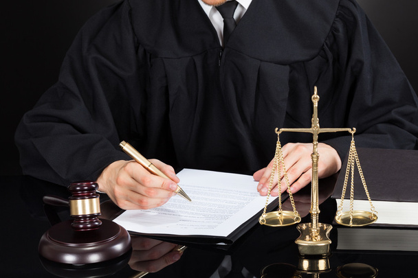 Judge Writing On Paper - Фото, изображение