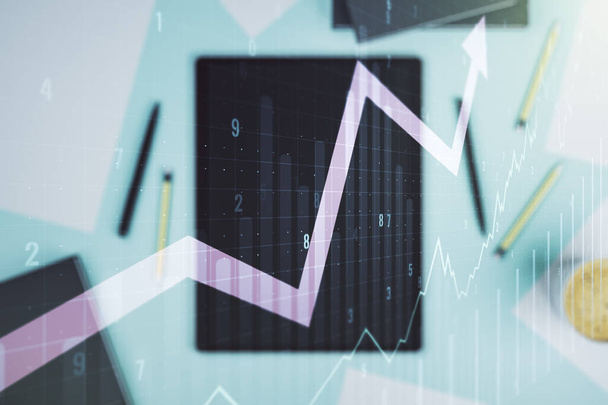 Double exposure of abstract creative financial chart with upward arrow and digital tablet on background, top view, research and strategy concept - Fotó, kép