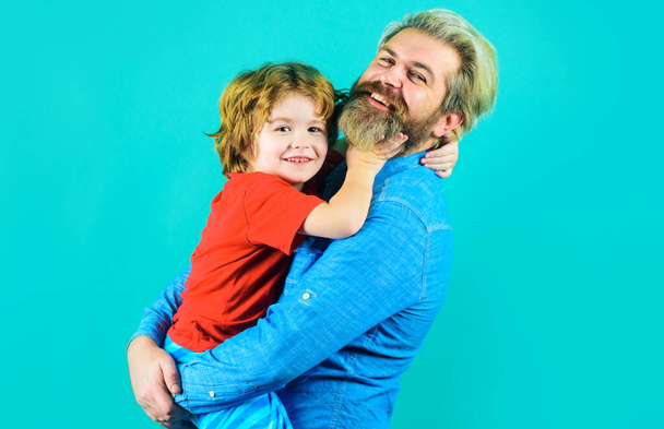 Fathers day. Dad hugs with little son. Family relationships. Parentship concept. - Фото, изображение