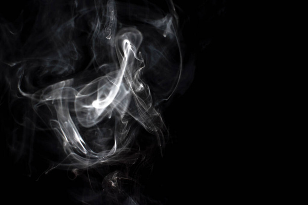 cloud of white smoke on black background - Фото, изображение