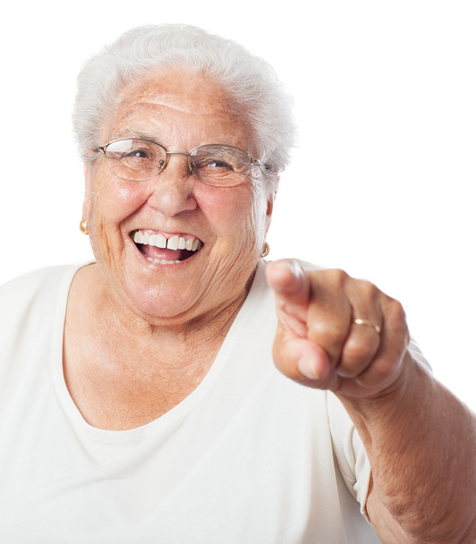 Ältere Frau zeigt mit dem Finger - Foto, Bild