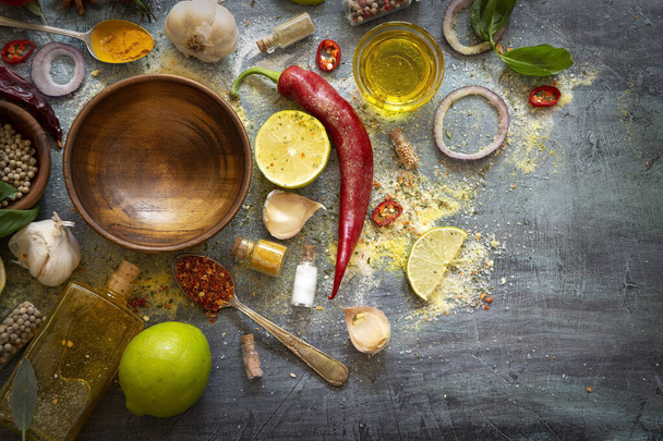 Various herbs and spices on grunge background - Foto, Imagem