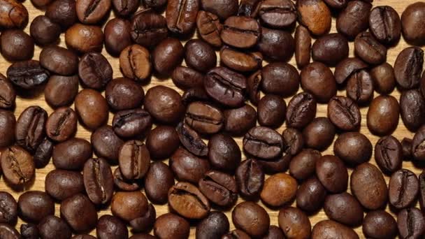 Велика кількість кавових зерен крупним планом
 - Кадри, відео