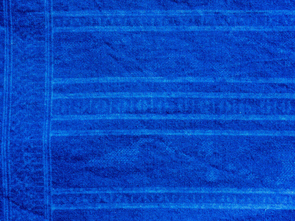 Indigo azul tecido gravata tintura fundo padrão. Textura de tecido tingido de indigo com padrão de motivo gráfico étnico abstrato. - Foto, Imagem