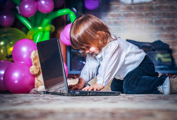 Baby girl  with laptop - Photo, Image