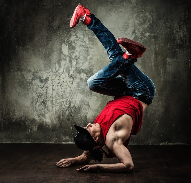 Man dancer showing break-dancing moves - Fotoğraf, Görsel
