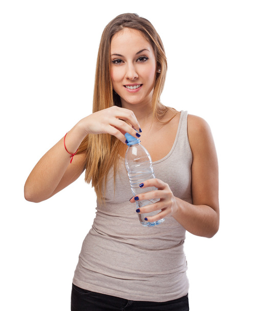 Femme ouverture bouteille d'eau
 - Photo, image