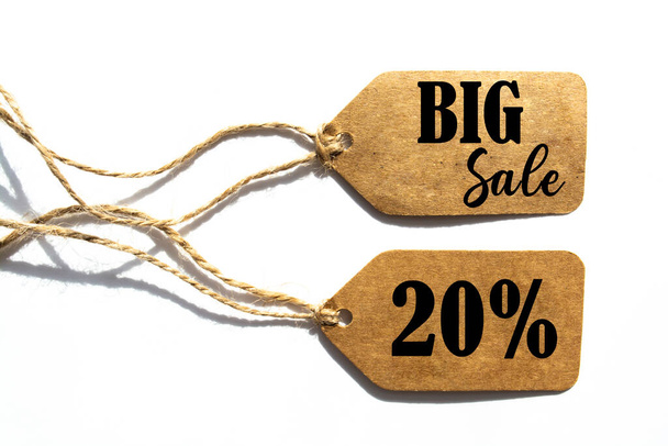 Big Sale 20% від цінника з коричневою ниткою на білому тлі
 - Фото, зображення