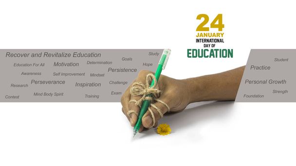 πένα σφιχτά δεμένη με το χέρι. δημιουργική κάρτα ιδέα για σπουδές, επιμονή, επιμέλεια, επιμονή, Παγκόσμια Ημέρα Εκπαίδευσης, 24 Ιανουαρίου, Ανάκτηση και αναζωογόνηση της εκπαίδευσης για τη γενιά COVID 19 - Φωτογραφία, εικόνα