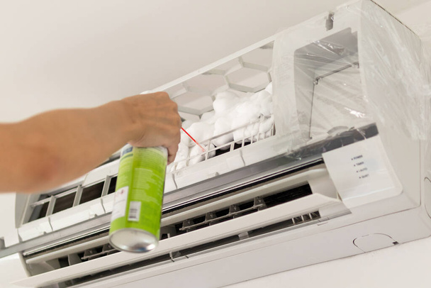 air conditioner cleaning with spray foam cleaner - Photo, Image