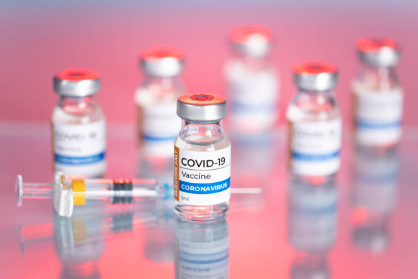 Coronavirus Covid-19 Vaccine vial glass bottles and syring - Photo, image