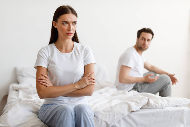 Offended Wife After Conflict With Husband Sitting In Bedroom - Foto, Imagem
