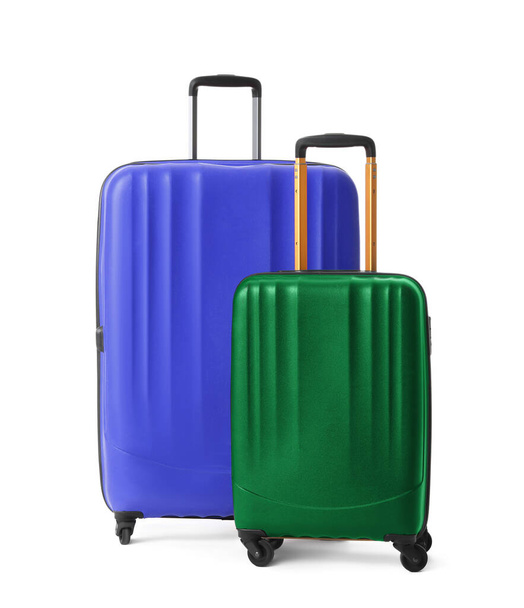 Modern suitcases for travelling on white background - Photo, Image