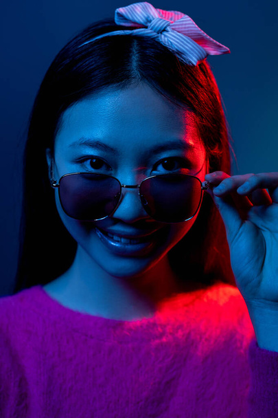 color light face eyewear blue pink neon asian girl - Fotoğraf, Görsel