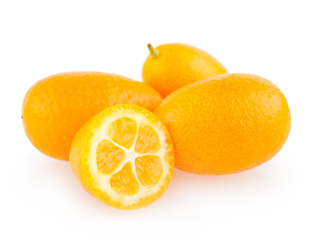 Kumquats en blanco
 - Foto, Imagen