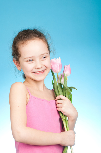 niña con tulipanes
 - Foto, Imagen
