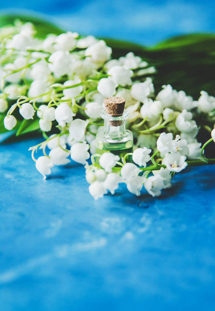 lily of the valley extract in small jars. Selective focus.nature - Photo, Image