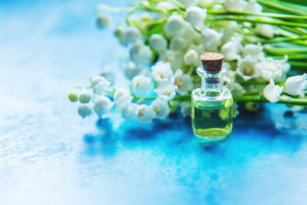 lily of the valley extract in small jars. Selective focus.nature - Photo, Image