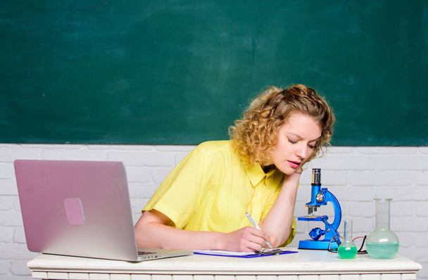 Molecular biology PhD projects. Scientist microbiology. Study microbiology. Investigate molecular modifications. Scientific research. Microbiology concept. Student girl with laptop and microscope - Foto, imagen