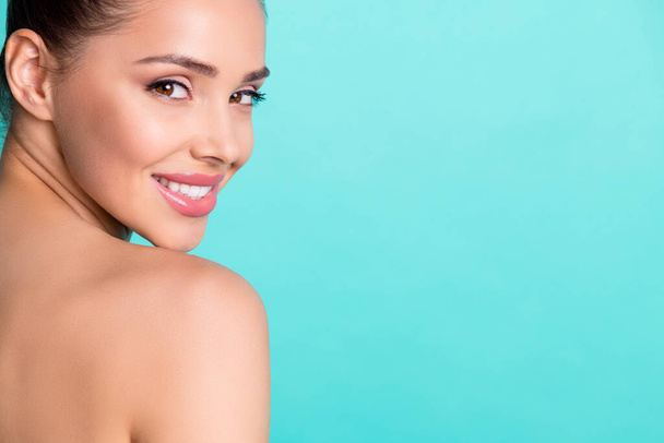 Cropped close-up profile side view portrait of shine cheery girl aesthetic enhancement copy space isolated over bright teal turquoise color background - Φωτογραφία, εικόνα