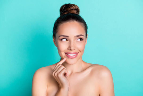 Photo of young charming dreamy stunning woman look copyspace apply hydrating toner isolated on turquoise color background - Φωτογραφία, εικόνα