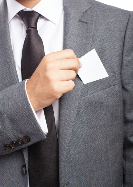 Business man picking business card - Foto, afbeelding