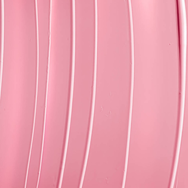 Pinkfarbener Lippenstift oder Lipgloss als kosmetischer Hintergrund, Make-up und Kosmetikprodukt für Luxusmarken, Urlaubsflachkulisse oder abstrakte Wandkunst und Farbstriche - Foto, Bild