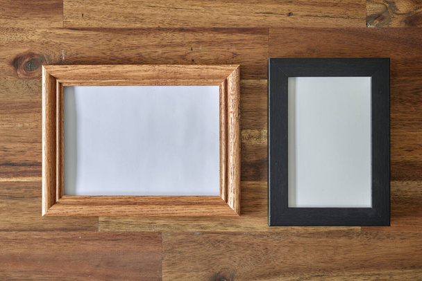 A studio photo of a timber photo frame - Фото, изображение