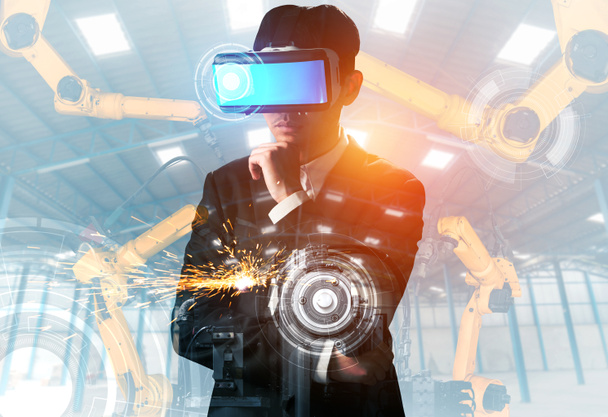 Μελλοντική τεχνολογία VR για μηχανοποιημένο έλεγχο βραχίονα ρομπότ βιομηχανίας - Φωτογραφία, εικόνα