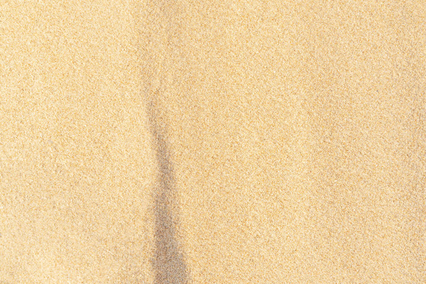 Fundo de textura de areia na praia. Luz bege mar areia textura padrão, fundo de praia arenosa. - Foto, Imagem