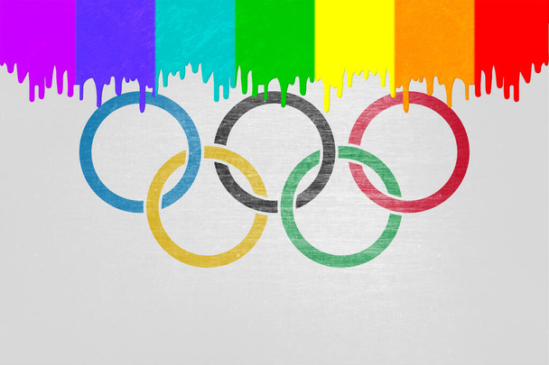 Olimpiyat Oyunları bayrağının üzerine (gökkuşağı bayrağının renginde) boya damlıyor - Fotoğraf, Görsel