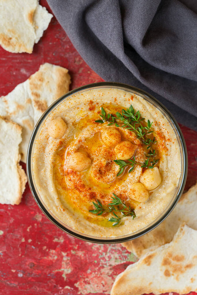 Chickpea hummus with paprika, olive oil and pita bread - Photo, Image