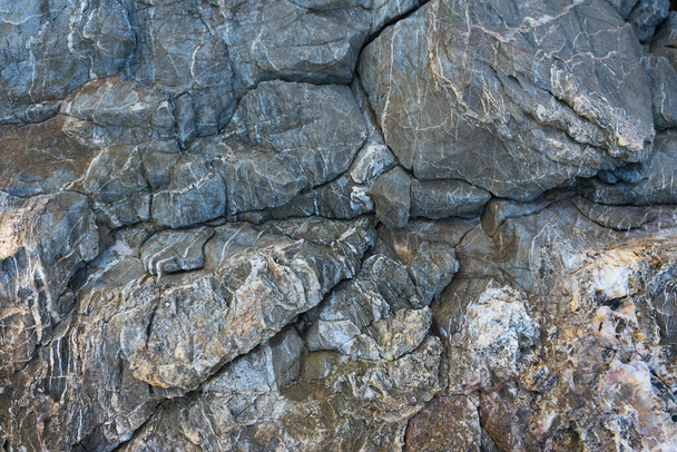 Stein Textur Hintergrund mit einzigartigen Muster. Gesteinsoberfläche abstrakten Hintergrund. Naturstein Hintergrund. - Foto, Bild