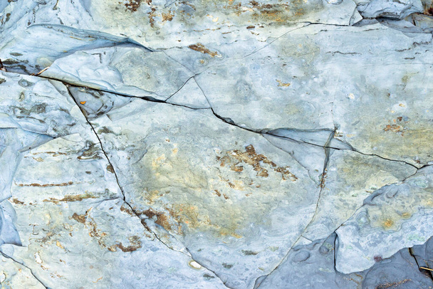 Фон из камня с уникальным рисунком. Камень поверхности абстрактного фона. Природный камень. - Фото, изображение