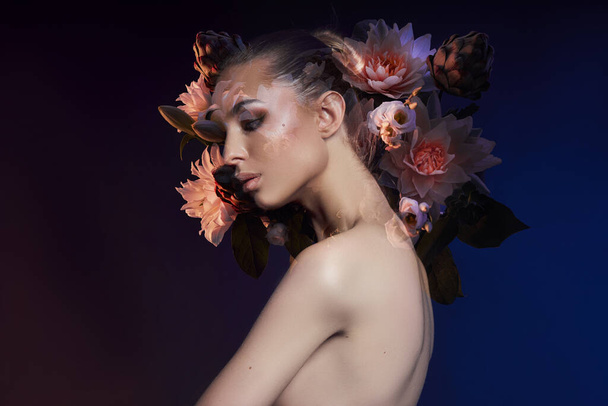 Beauty flowers face of a woman with double exposure. Portrait of a girl neon light and color, professional makeup, nude back of a woman, flowers in the head - Fotó, kép